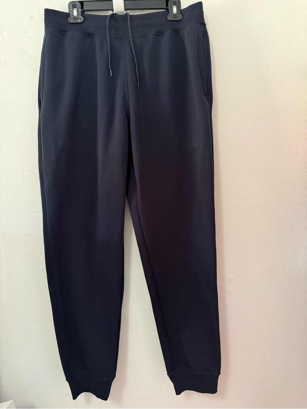 Navy blue UNIQLO Heattech pile lined sweatpants in size L. NWT